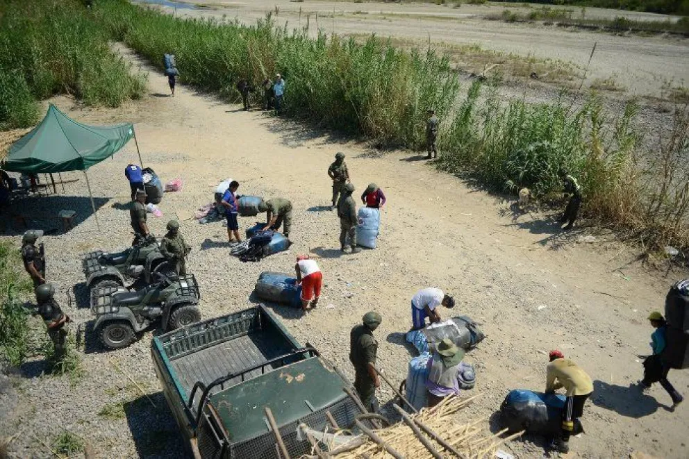 Quién era la mujer hallada muerta en el río Pescado