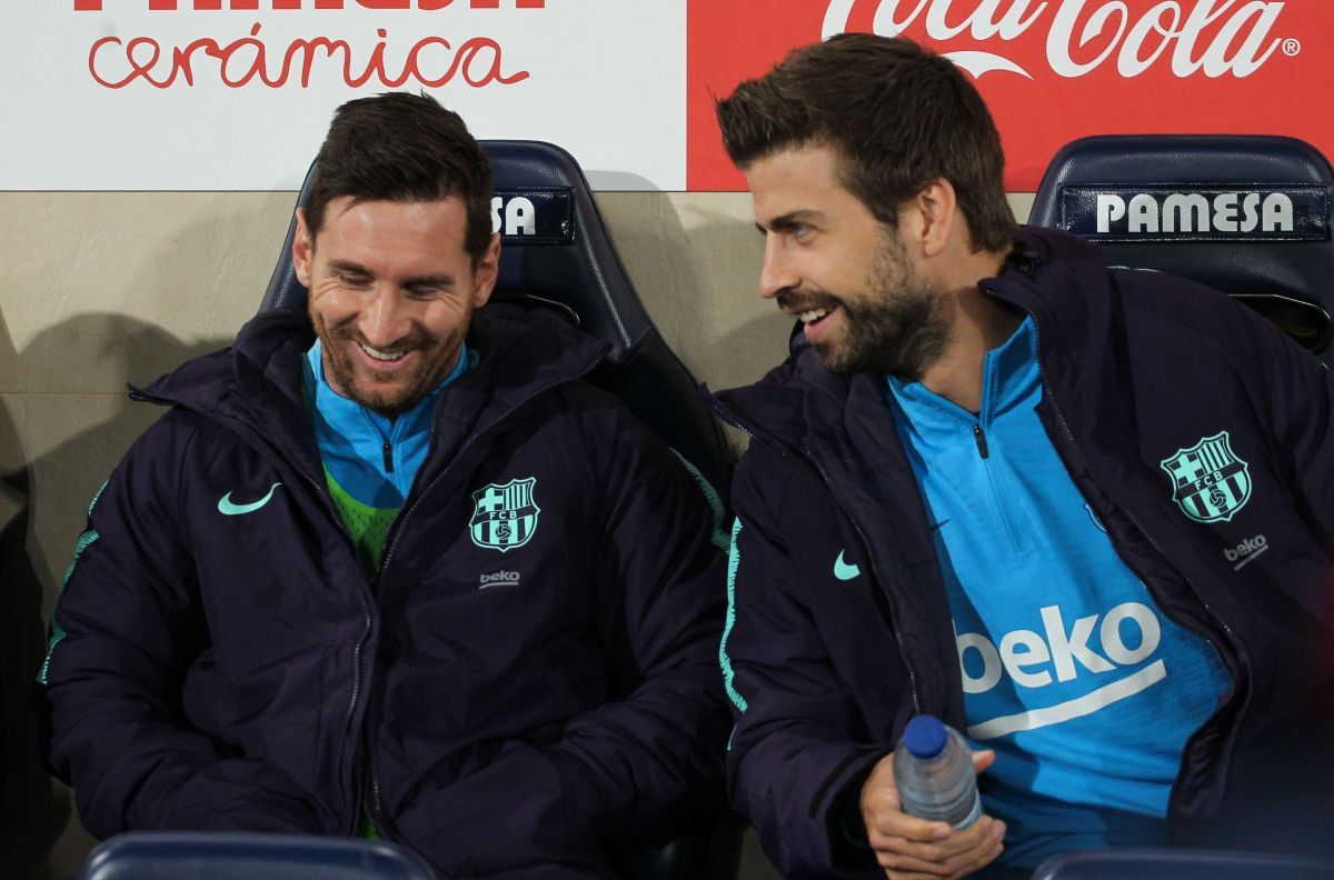 Gerard Piqué y Lionel Messi.